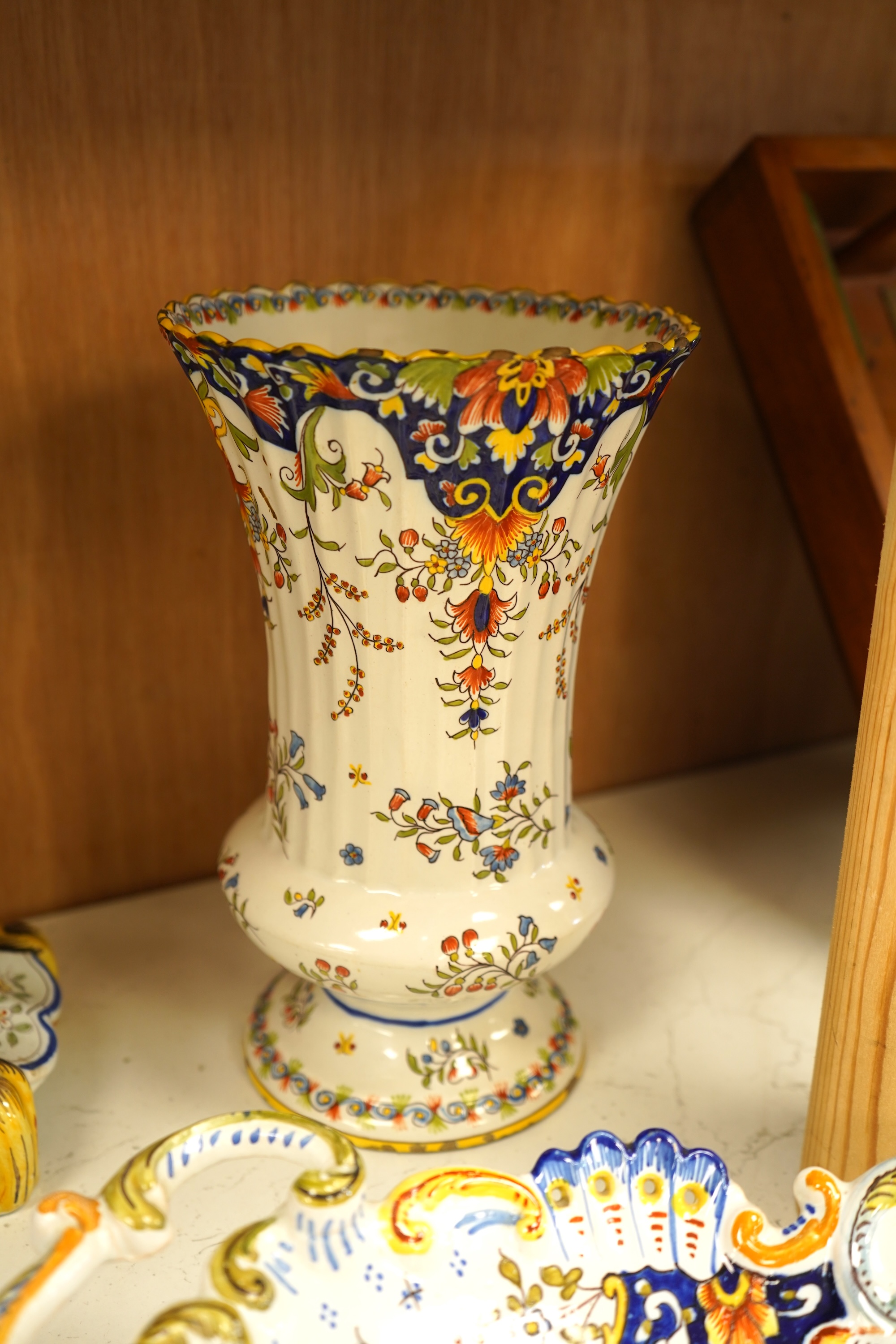 A collection of early 20th century French faience pieces To include dishes, an inkwell and a large ewer, 42cm high